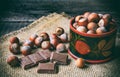 Chocolade and hazel nuts in wooden box Royalty Free Stock Photo