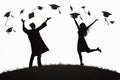 Silhouettes of a man and a woman celebrating graduation on a grassy hill. Royalty Free Stock Photo