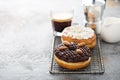 Chocolate and almond donuts with coffee Royalty Free Stock Photo