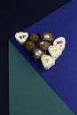 chocolate assortment candies isolated on geometric box