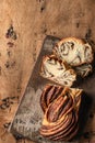 Chocolate Babka or Brioche Bread. Homemade sweet yeast pastry chocolate swirl bread sliced on wooden rustic board with Royalty Free Stock Photo