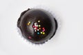 Chocolate ball with topping in paper cup Royalty Free Stock Photo