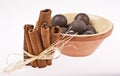 Chocolate balls and cinnamon sticks isolated