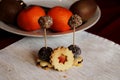 The chocolate balls spellet on a spit with sweets Royalty Free Stock Photo