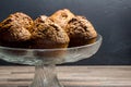 Chocolate banana baked muffins in glass stand with copy space Royalty Free Stock Photo