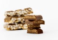Chocolate bar. Broken  pieces over white background. Royalty Free Stock Photo