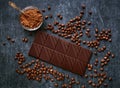 Chocolate bar, cocoa powder and fresh fried coffee beans Royalty Free Stock Photo