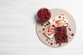 Chocolate bars with freeze dried fruits on white wooden table, top view. Space for text Royalty Free Stock Photo