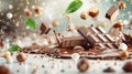 Chocolate bars and hazelnuts fall into a pool of melted chocolate, creating a delicious and messy scene Royalty Free Stock Photo