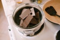 Chocolate bars are melted in a glass bowl on a steam bath. Royalty Free Stock Photo