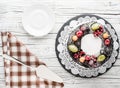 chocolate berry cake on plate over white wooden background Royalty Free Stock Photo