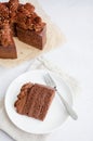 Chocolate Birthday cake. A slice of delicious chocolate cake on a light background. Piece of Cake on a white Plate. Sweet food. Royalty Free Stock Photo