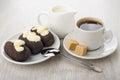 Chocolate biscuit cakes in saucer, milk, black coffee, brown sugar Royalty Free Stock Photo