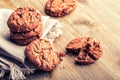 Chocolate biscuit cookies. Chocolate cookies on white linen napkin on wooden table Royalty Free Stock Photo