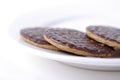 Chocolate biscuits on a white plate