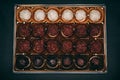 Chocolate box with dark and milk chocolate, and coconut ball sweets Royalty Free Stock Photo