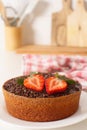 Chocolate Brigadeiro cake with strawberries in a counter top in the kitchen Royalty Free Stock Photo