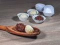 Chocolate brigadeiro in wooden spoon. Brigadeiro, traditional Brazilian sweet. Royalty Free Stock Photo