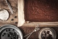 Chocolate brownie on the baking tray with blueberry and plates horizontal