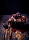 Chocolate brownie with blackberries on rustic wooden surface. Generative Ai Royalty Free Stock Photo