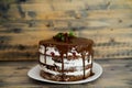 Chocolate brownie cake with cherries on a wooden table Royalty Free Stock Photo