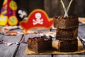 Chocolate brownie. Treats for children`s holiday. Pirate Party