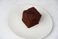 Chocolate Brownie in plate isolated on white background Royalty Free Stock Photo