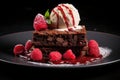 Chocolate brownie with raspberries and a scoop of ice cream Royalty Free Stock Photo