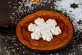 Chocolate brownie with snowflake candy on the top Royalty Free Stock Photo