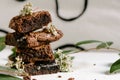 Chocolate brownies, with black biscuit stuffed with cream