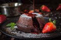 a chocolate bundt cake with a strawberry on the side and chocolate sauce drizzled on top of the bundt cake, with chocolate chips