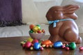 Chocolate bunny with Easter eggs on table