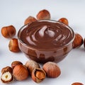 Chocolate butter and hazelnuts on a white acrylic background Royalty Free Stock Photo