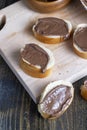 Chocolate butter spread on bread while cooking breakfast Royalty Free Stock Photo