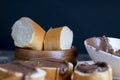Chocolate butter spread on bread while cooking breakfast Royalty Free Stock Photo