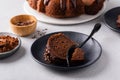 Chocolate cake baked in a bundt pan with chocolate ganache glaze Royalty Free Stock Photo