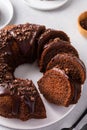 Chocolate cake baked in a bundt pan with chocolate ganache glaze Royalty Free Stock Photo