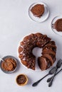 Chocolate cake baked in a bundt pan with chocolate ganache glaze Royalty Free Stock Photo