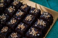 Chocolate Cake Brownie Squares Drizzled With Chocolate Nutella and Walnuts.