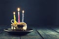 Chocolate cake with a candle and gifts.Happy Birthday, card. Holidays greeting card. Royalty Free Stock Photo