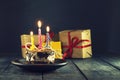 Chocolate cake with a candle and gifts.Happy Birthday, card. Holidays greeting card. Royalty Free Stock Photo