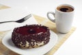 Chocolate cake with cherry jelly and coffee Royalty Free Stock Photo