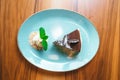 Chocolate cake with cookies and a scoop of vanilla ice cream top view of the table Royalty Free Stock Photo