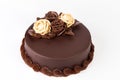 Chocolate cake with creamy roses decoration on top