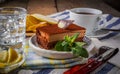 Chocolate cake and a cup of tea; water with ice and slices of pe Royalty Free Stock Photo