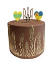 Chocolate cake decorated with ears of wheat with the Ukrainian coat of arms and hearts Royalty Free Stock Photo