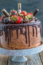 Chocolate cake decorated with fresh strawberries. Royalty Free Stock Photo