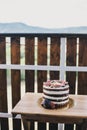 Chocolate cake with figs and nuts on a wooden table Royalty Free Stock Photo