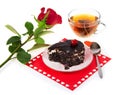 Chocolate cake, hot tea and red rose Royalty Free Stock Photo