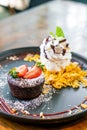 chocolate cake lava with strawberry and vanilla ice-cream Royalty Free Stock Photo